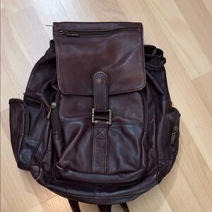 Women's Brown Leather Backpack - 2 side pouches, front pouch and top pouch.